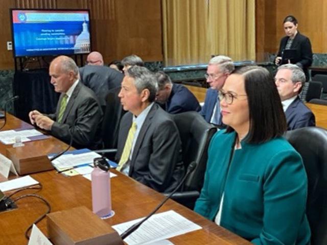 From left, Jose Emilio Esteban, the nominee to be Agriculture undersecretary for food safety; Vincent Logan, the nominee to be a member of the Farm Credit Administration board; and Alexis Taylor, the nominee to be Agriculture undersecretary for trade and foreign agricultural affairs, wait to testify Thursday before the Senate Agriculture Committee at their confirmation hearing. (Photo by DTN Political Correspondent Jerry Hagstrom)