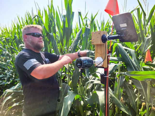 FIRST field manager Nathan Roux shows off one of the cameras that are a part of DTN&#039;s partnership with FIRST. Expect to hear from more of FIRST&#039;s managers and cooperators throughout the Digital Yield Tour. (DTN photo by Katie Dehlinger)