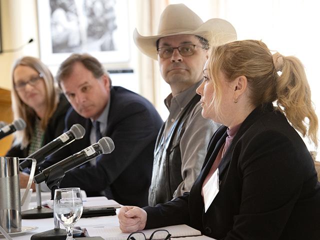 Jacqui Fatka, left, moderates a panel discussion with Robert Bonnie, undersecretary for Farm Production and Conservation (FPAC); Zach Ducheneaux, the Farm Service Agency (FSA) administrator; and Heather Manzano, deputy administrator for compliance at the Risk Management Agency. (DTN/Progressive Farmer photo by Joel Reichenberger)