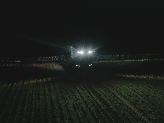 A new sense-and-act weed sprayer is being tested by Fendt in cooperation with Bosch-BASF. It is a two-tank solution that gives growers the flexibility to perform both green-on-brown and green-on-green daytime or nighttime spray operations. This photo shows the Smart Spraying tool working at night. (Photo courtesy of AGCO-Fendt)