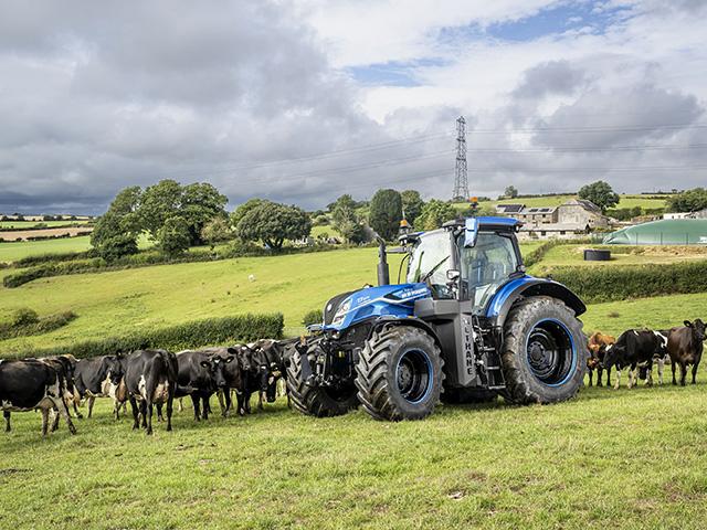 New Holland's T7 Methane tractor, dairy cattle and covered lagoons are parts of a system that produces an on-farm source of methane fuel. (Photo courtesy of New Holland)