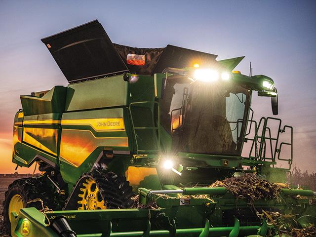 Deere's new S7combine series has been fitted with stereo cameras that analyze the crop mass out front and by those measurements, adjusts speed and settings to optimize productivity. (Photo courtesy of John Deere)