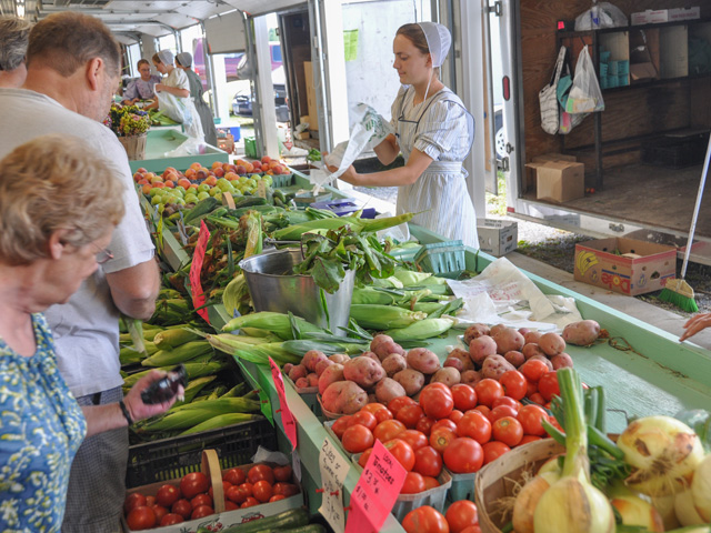 Farmers markets had grown tremendously before COVID-19 hit. A pair of congressmen on Monday wrote a bipartisan letter to USDA to broaden how the department determines losses to account for farmers who may sell direct to consumers but have lost sales because of COVID-19. USDA has given out nearly $6 billion of $16 billion in aid. (DTN file photo by Chris Clayton) 