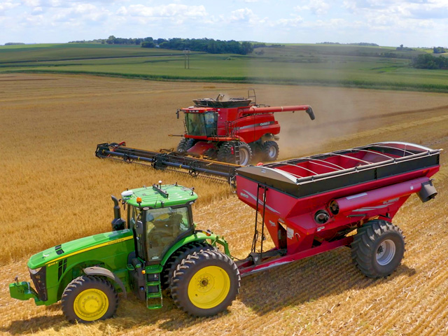 OMNiDRIVE is Raven&#039;s aftermarket technology kit that allows farmers to monitor and operate a driverless tractor with grain cart from the cab of the harvester. (Photo courtesy of Raven Industries)