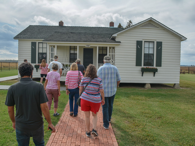 A tour group gets ready to visit Johnny Cash&#039;s boyhood home near Dyess, Arkansas. The Cash family farmed in the area for nearly 20 years. Cotton was the primary crop. Tourists learn about Johnny&#039;s childhood and region&#039;s agricultural history. (DTN photo by Matthew Wilde)
