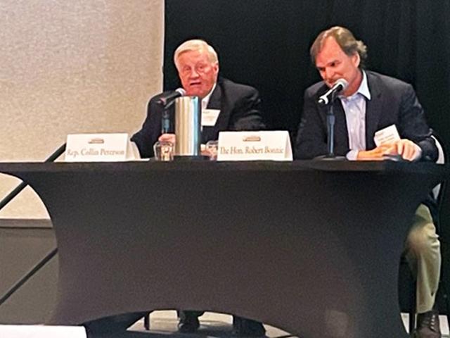 Former House Agriculture Committee Chairman Collin Peterson, D-Minn., left, moderates a question-and-answer session with Agriculture Undersecretary for Food Production and Conservation Robert Bonnie at the American Sugar Alliance International Sweetener Symposium in Vail, Colorado, on Monday. (Photo by Jerry Hagstrom)