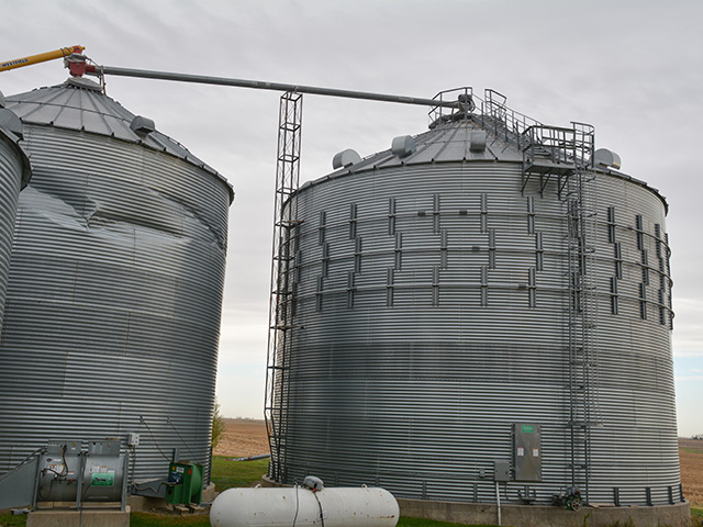 Wade Wilson, who farms near Dysart, Iowa, had wind rings installed on the bin on the right when it was built, which helped it survive the recent derecho. The bin on the left didn&#039;t have wind rings or other options to help it withstand prolonged, violent winds. (DTN/Progressive Farmer photo by Matthew Wilde)