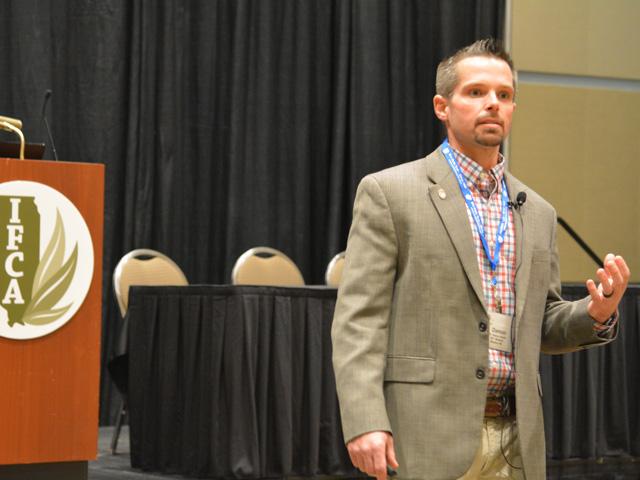 Damon Smith, a University of Wisconsin plant pathologist, tells farmers and chemical suppliers at the recent Illinois Fertilizer and Chemical Winter Convention that tar spot will likely be a yield-robbing pathogen to deal with on a yearly basis. (DTN/Progressive Farmer photo by Matthew Wilde)