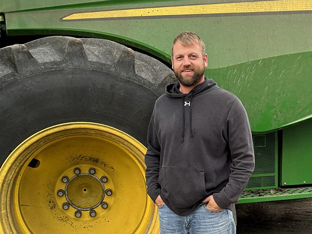 With a yield of 129.98 bushels per acre, Brad Disrud of Rolla, North Dakota, earned the title of "Bin Buster" in the dryland spring wheat category of the 2023 National Wheat Yield Contest. (DTN photo by Jason Jenkins)