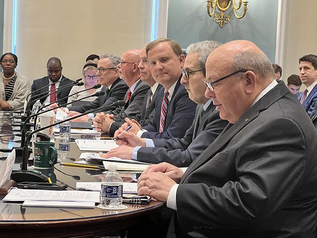 Corey Rosenbusch, president and CEO of the Fertilizer Institute, looks over as Zippy Duvall, president of the American Farm Bureau Federation, testifies before the House Agriculture Committee on Tuesday. While agricultural groups testified, another House committee voted to repeal the waters of the U.S. (WOTUS) rule. (DTN photo by Chris Clayton)