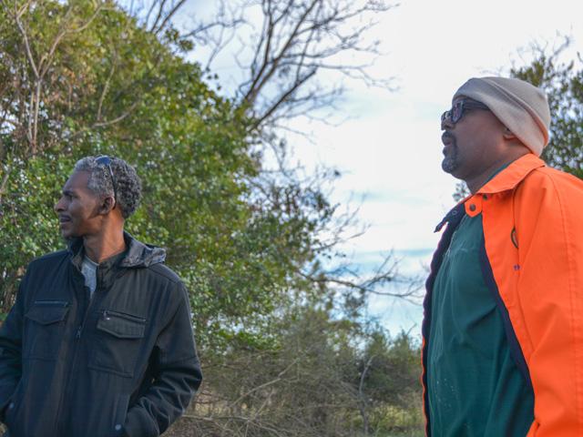 Greg Mullins, left, and Wayne Swanson look over some of the more than 500 acres of ground a group of 19 Black families from Atlanta have bought in rural Georgia. The group looks to develop the property into both a farm and a community. (DTN photo by Chris Clayton)
