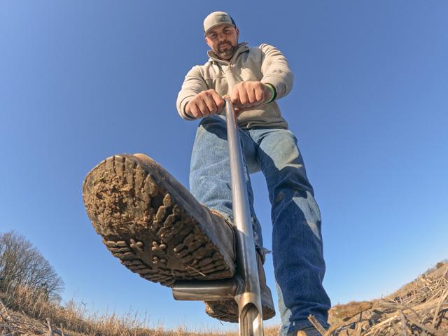 Zachary Grossman put his foot into the job and pulled soil samples this week to check Soybean Cyst Nematode (SCN) reproduction in his Missouri fields as part of a View From the Cab project. (DTN photo by Jason Jenkins)
