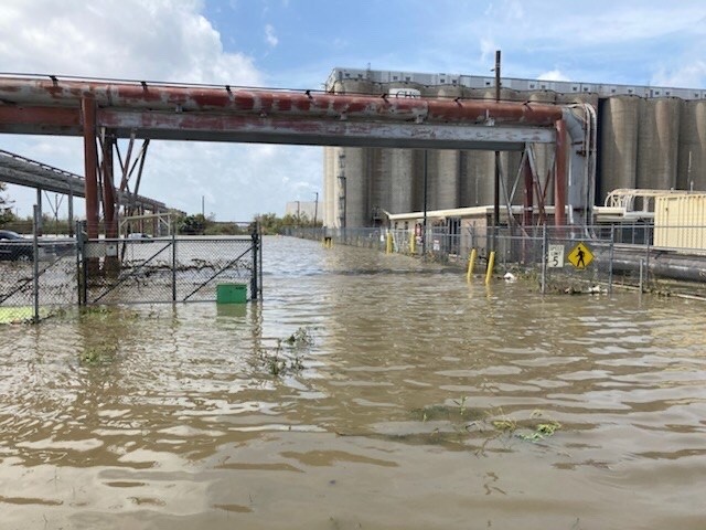 A photo of flooding at the CHS Inc. grain terminal at Myrtle Grove, Louisiana, on Aug. 31. The CHS facility, with 6.4 million bushels of grain capacity, is the most southern grain export facility on the lower Mississippi River. (Photo courtesy of Turn Services and CHS) 