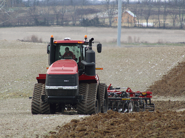 Andrew Klopfenstein, an Ohio State University precision agriculture researcher, disk rips a field farmed by Dug Radcliff of Centerville, Ohio, as part of a prescription tillage study with Case IH in the fall of 2018. (DTN Photo Courtesy of Ohio State University.)