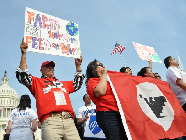 Farm workers in 2013 rallied at the U.S. Capitol calling for Congress to pass an immigration reform bill. At that time, a bill passed the Senate, but failed to advance in the House. This time around, a bill proposed by President Joe Biden could have a harder time passing in the Senate. (DTN file photo by Chris Clayton)