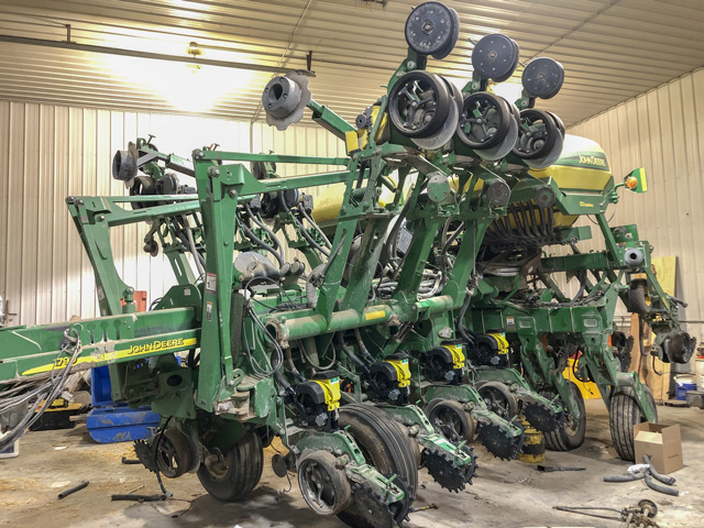 A John Deere 1790 planter owned by Jeff Jorgenson sits in the Sidney, Iowa, farmer&#039;s shop for its annual pre-season tune-up. Jorgenson is also installing new equipment on the planter, such as electric drives on row units, to make it more efficient. (DTN Photo Courtesy of Jeff Jorgenson.)