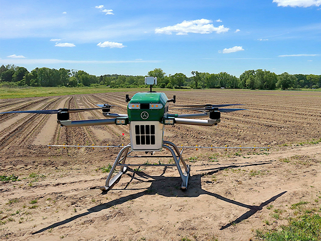 The 500-pound Guardian SC1 drone is the only electric, aerial crop protection system approved for large-scale ag. SC1 delivers product with a 16-foot boom, treating 40 acres per hour. (Photo courtesy of Guardian Agriculture)