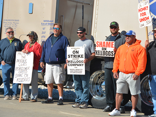 Kellogg workers in Omaha stand near a picket line as they strike against the cereal and snack-food company. Like Deere workers, Kellogg&#039;s union voted against a contract that would create a two-tier system for pension benefits. The strikes come as the country faces a growing labor shortage. (DTN photo by Chris Clayton)