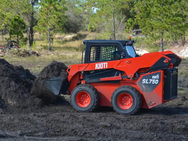 A KIOTI dealer sees what the new SL750 skid loader can do at a ride-and-drive event during the company&#039;s annual dealer meeting recently in Orlando, Florida. (DTN photo by Matthew Wilde)