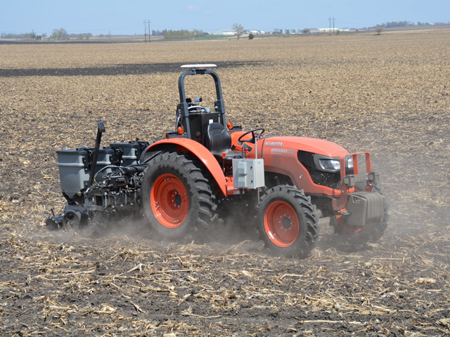 A driverless tractor and planter operated by Sabanto, a robotic farming company, seeds soybeans near Sac City, Iowa, last month. (DTN/Progressive Farmer photo by Matthew Wilde)