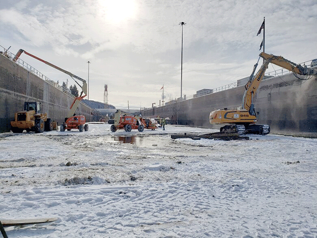 Lock and Dam 4 in Alma, Wisconsin, was dewatered after the end of the 2020 navigation season. Major winter maintenance like this occurs about every 20 years and includes concrete repairs, sandblasting and repainting the miter gates and updating the bubbler system used to prevent ice buildup within the lock chamber. (Photo courtesy of the USACE St. Paul District)