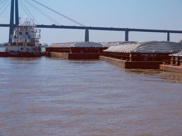 Barges dock on the lower Mississippi River in Louisiana. The House of Representatives on Tuesday passed a new Water Resources Development Act (WRDA) that would increase funding available for inland waterway projects through a shift in cost-share for such projects.  (DTN file photo) 