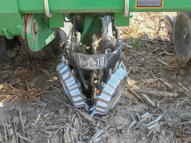 Making sure planter row cleaners are maintained and adjusted properly is one of the best ways to manage crop residue. Tillage is another option. (DTN photo by Pamela Smith)