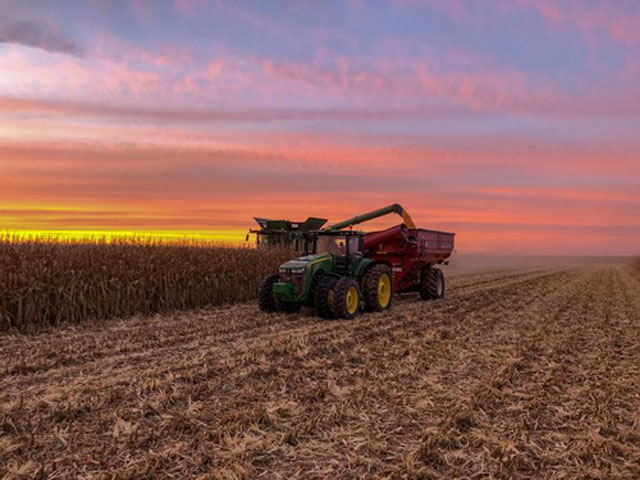 The painted fall skies of central Illinois make a beautiful backdrop for harvest. (Tanner Mickey photo)