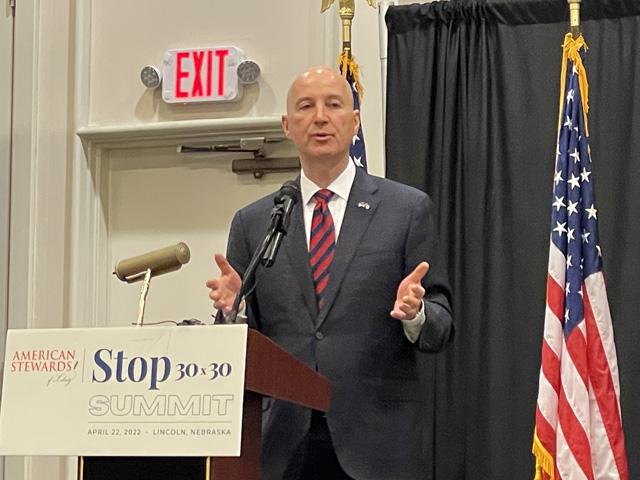 Nebraska Gov. Pete Ricketts told an audience of landowners and state- and county-level politicians from around the country at the first national "Stop 30x30" summit in Lincoln, Nebraska, that they need to prepare to resist the Biden administration&#039;s efforts to conserve 30% of all land and water by 2030. (DTN photo by Todd Neeley)