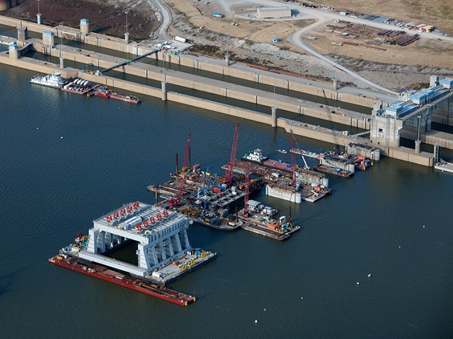 An aerial view of the Olmsted Locks and Dam upstream of the confluence of the Ohio and Mississippi rivers, was one of the costliest U.S. Army Corps of Engineers projects in the inland waterways system. The Trump administration is proposing fees or tolls for inland waterway users that could come back to bite farmers. (Photo courtesy of the Army Corps of Engineers)