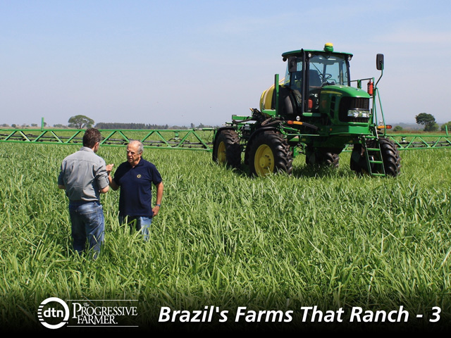 Carlos Viacava gives an interview to a local TV reporter. Viacava had just desiccated the pasture to prepare it for soybeans on his farm in Caiua, western Sao Paulo. (DTN photo by Alastair Stewart)