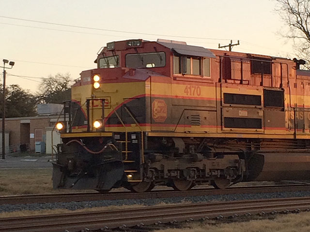 A Kansas City Southern train moves south in San Antonio, Texas, at dusk. (DTN photo by Mary Kennedy)
