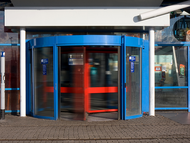 A revolving door of short-term employees probably indicates you need a more formal orientation process. (Photo by by Marcel Oosterwijk; CC BY-SA 2.0)