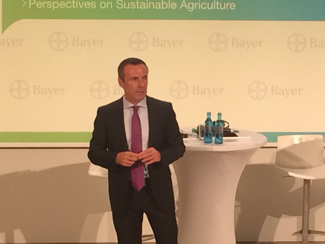 Bayer's role in future farming innovations was Liam Condon's message during the Bayer's press conference while questions over consolidation continue. (DTN photo by Pamela Smith)