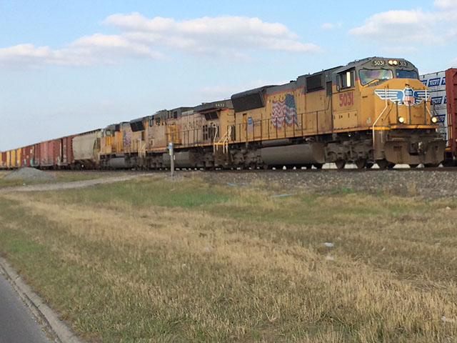 A Union Pacific train passes another train on a double track as it moves through San Antonio, Texas. As train sizes grow, so do fears of safety issues. That has led to the Government Accountability Office (GAO) being asked to study the effects of longer freight trains. (DTN photo by Mary Kennedy)