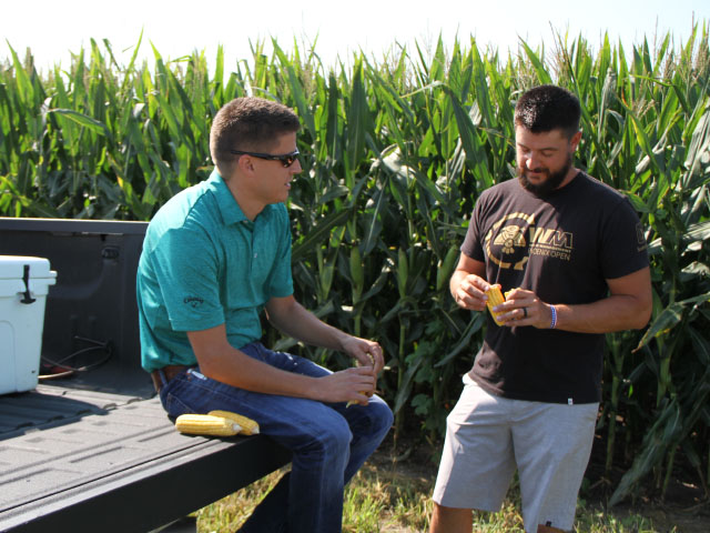 Assessing hybrids and varieties now helps plan for the coming season. Brian Wood, of Raymond, Illinois, depends on seed representative Dave Wallner to help him sort through the maze of new numbers. (DTN Photo by Pamela Smith)