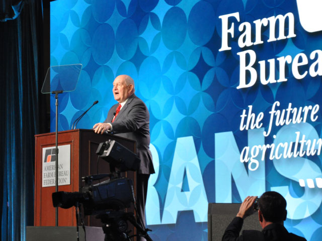Agriculture Secretary Sonny Perdue speaking to the American Farm Bureau Federation in 2018. In this year's speech, Perdue highlighted NASS crop production data and his belief NASS is closer to correct than the market expected. (DTN file photo) 