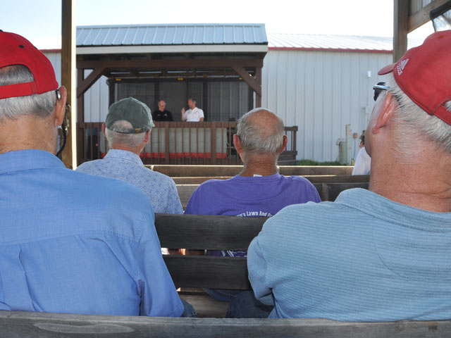 Farmers listen to a talk on the struggling ag economy -- followed shortly by a session on how to get rid of stress on the farm -- at the Farm Science Review in London, Ohio. (DTN photo by Emily Unglesbee)
