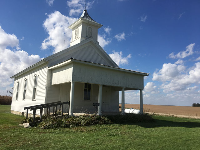 Lone Tree Schoolhouse is all that is left of Lone Tree Corners, also known as Lone Tree, a former community east of Bradford, Illinois, in Bureau County. The town was established in 1840 and demolished in 1920s -- with the exception of the school. It was closed in 1942, but continues to stand and is listed on the National Register of Historic Places. (DTN photo by Pamela Smith)