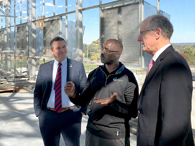 U.S. Rep Don Bacon, R-Neb., (left) hosted House Agriculture Committee Chairman Michael Conaway, R-Texas, (right) on Monday. They toured Whispering Roots, an urban agriculture nonprofit working to grow vegetables and raise fish in a new facility under construction near downtown Omaha. (DTN photo by Chris Clayton)