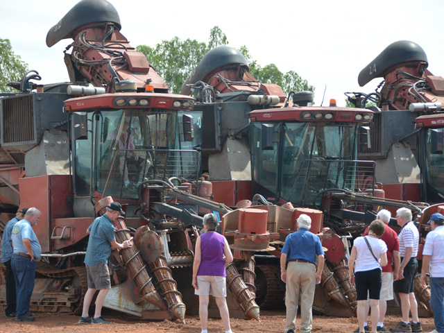 Farmers from the Midwest and Canada, along with their spouses, check out sugar-cane harvesters during a trip to a sugar refinery and ethanol plant in south-central Mato Grosso, Brazil in early February. (DTN photo by Chris Clayton)