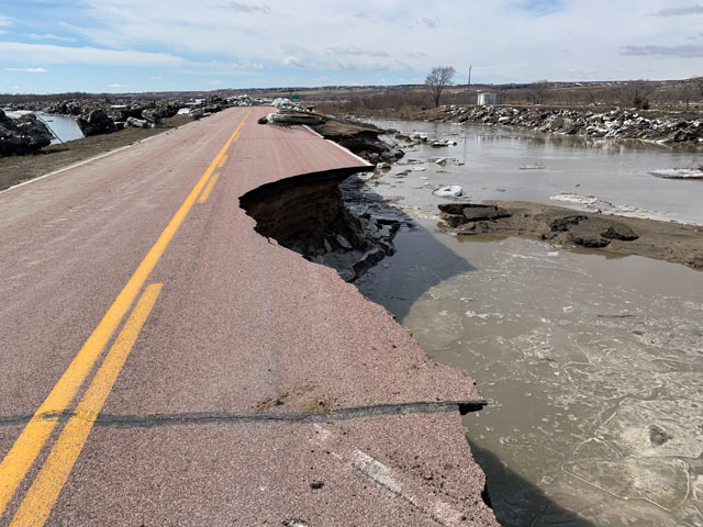 A damaged road in northwest Nebraska following floods that hit the state in mid-March. Congress continues to work on a possible disaster package. (Photo courtesy of the Nebraska governor's office)