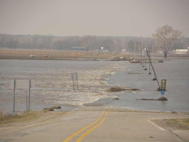 A flooded roadway off Interstate 29 last spring in southwest Iowa after heavy flooding along the Missouri River. Eight senators from states impacted by last year's flooding have introduced a bill requiring the Corps to reduce flood risks on the lower Missouri River. (DTN file photo by Chris Clayton) 