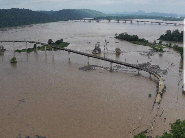 Arkansas is struggling with flooding on the Arkansas River as high flows out of Oklahoma move east toward the Mississippi River. The floodwaters have partially submerged this footbridge at Little Rock, Arkansas. (Photo courtesy of Dave Lay) 