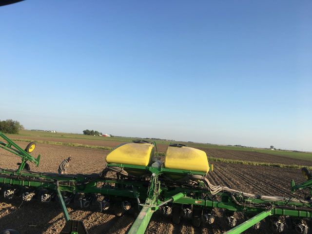 Illinois farmer Jeff Brown makes a quick emergency stop to see why one row on the planter isn't delivering seed properly. (DTN photo by Pamela Smith)