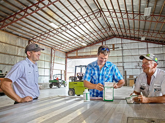 Managing employees, negotiating with vendors and digging into farm financials are just a few of the subjects Caleb Wilson (left) learned at The Executive Program for Agricultural Producers (TEPAP) last year. (DTN/Progressive Farmer photo by Jodi Miller)