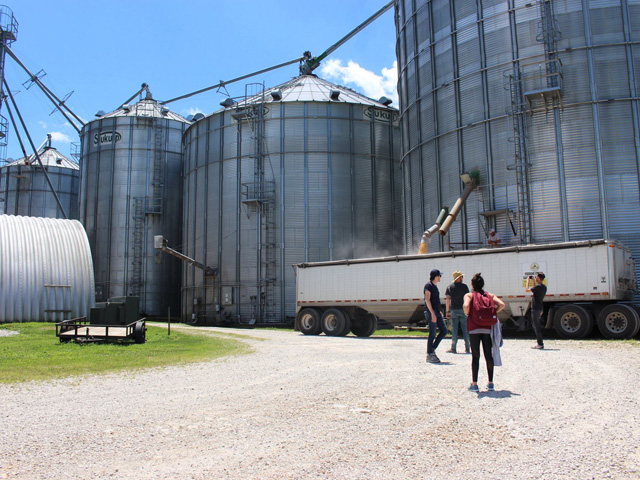 Bins are as common as sunshine across the Grain Belt -- a modern miracle of grain handling or a fatal trap when safety is ignored. Here, "SILO&#039;s" crew is scouting a location. (Progressive Farmer photo by Dan Miller)