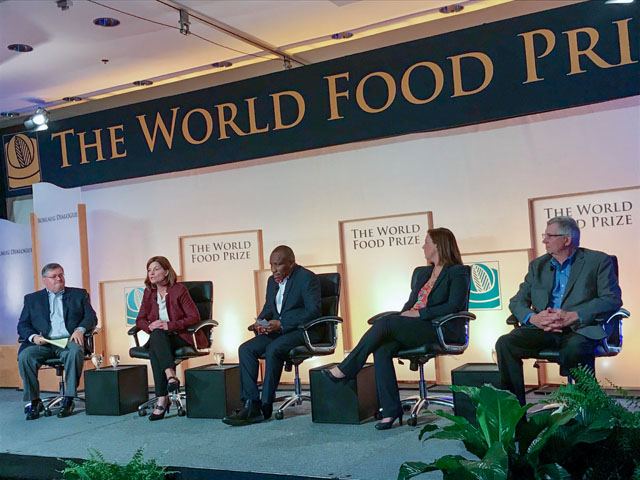 Polly Ruhland, CEO of the United Soybean Board, second from left, talks about the role of soybeans in global food security, and the need for more collaboration among proteins, during a panel discussion at the World Food Prize. Also on the panel, left to right: Kirk Leeds, CEO of the Iowa Soybean Association; Samuel Kwame Ntim Adu, CEO of Yend Agro Group in Ghana, Africa; Liz Hare, executive director of the World Initiative for Soy in Human Health; and John Heisdorffer, chairman of the American Soybean Association. (Photo courtesy of United Soybean Board)