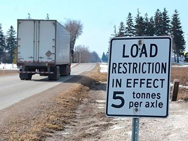 Each year during the spring thaw, state, county and local agencies impose weight and speed restrictions to protect roadways from damage. The exact dates that seasonal load restrictions go into effect and are removed vary depending on annual temperature variations. Many states have already put restrictions in place, with more scheduled to start March 9. (Photo by the City of Coon Rapids, Minnesota)