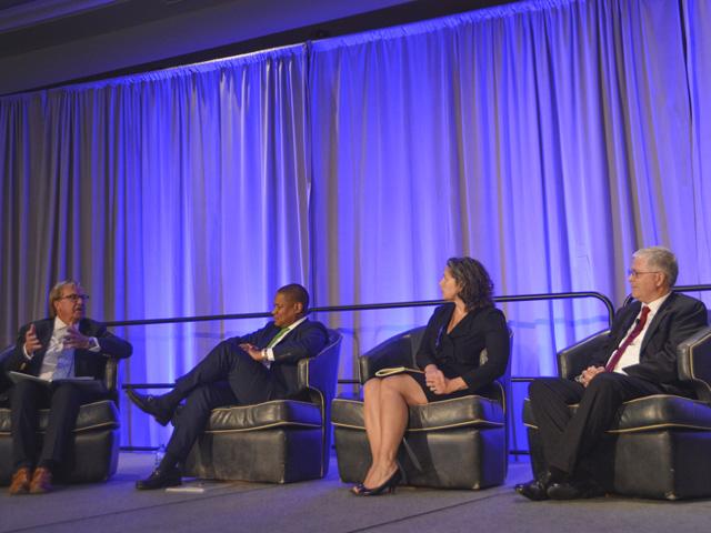 Kip Tom, far left, former ambassador to the U.N. Food &amp; Agriculture Organization, talks with Daniel Whitley, administrator for USDA&#039;s Foreign Agricultural Service; Christine Cochran, president and CEO of SNAC International; and Arlan Suderman, chief commodities economist for Stone X Group Inc. The panel discussion was part of an Ag Outlook Forum on Monday in Kansas City, Missouri. (DTN photo by Chris Clayton)